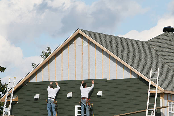Professional Emergency Siding Repair technician working in Freeman, VA